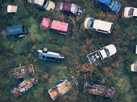 Aerial view of assorted abandoned cars and trucks in a field, Australia