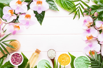 Beauty and fashion concept with spa set on pastel rustic wooden background.