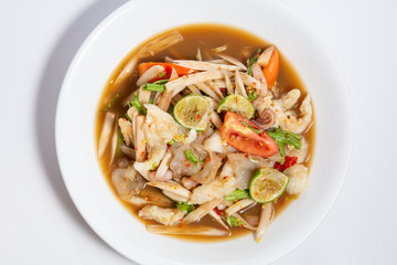 Top view,papaya salad (Som Tum) from Lotus root, add fresh shrimp very hot and spicy Thai  Food.