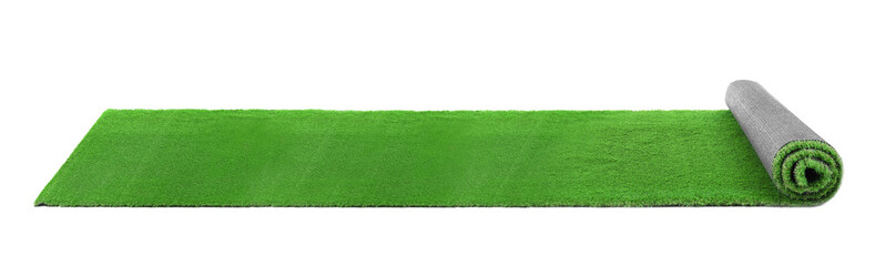 Rolled artificial grass carpet on white background. Exterior element