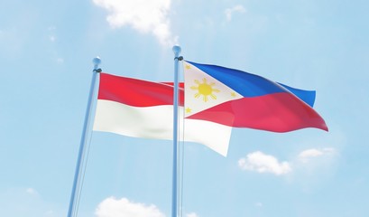 Philippines and Indonesia, two flags waving against blue sky. 3d image