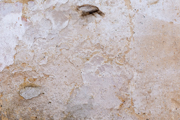 The old wall is platered to protect it from damage.