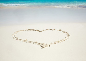 Heart on a tropical beach. Travel and relax concept. Love