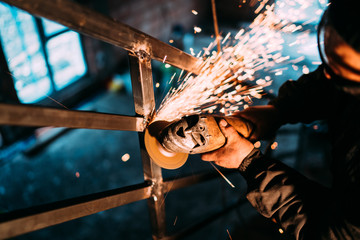 Details of grinder sparks, metalwork, steel and iron on construction site