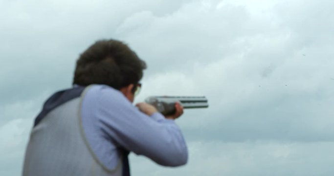 You can see the charge from the shotgun racing towards the clay pigeon hitting the target in slow motion.