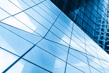 Fototapeta na wymiar Close-up of glass windows of skyscrapers