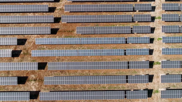 Solar panels field in desert. Alternative energy, ecology power conservation concept