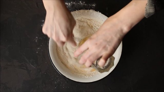 dough add flour mix, Stir (raw dough - ingredients). Footage