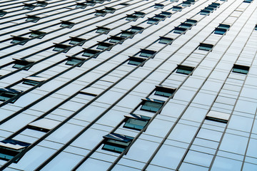 Close-up of glass windows of skyscrapers