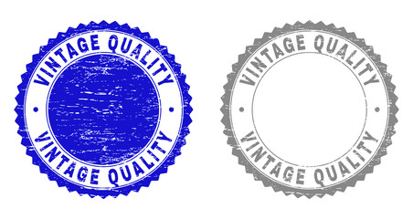Grunge VINTAGE QUALITY stamp seals isolated on a white background. Rosette seals with grunge texture in blue and gray colors.
