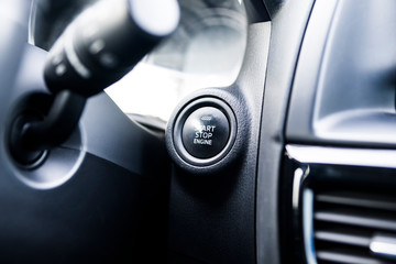 Naklejka premium Car interior. Start button. Black and white image.