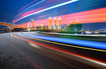 abstract image of blur motion of cars on the city road at night，Modern urban architecture in Chongqing, China