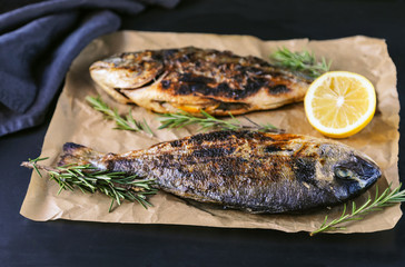 Grilled fish: sea bream with rosemary and lemon.