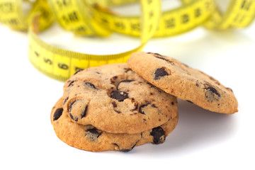 Chocolate Chip Cookie  with Measuring Tape Isolated on White, Diet Concept