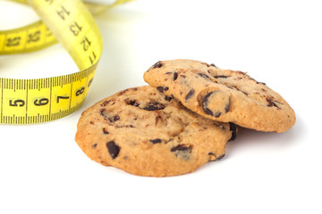 Chocolate Chip Cookie  with Measuring Tape Isolated on White, Diet Concept