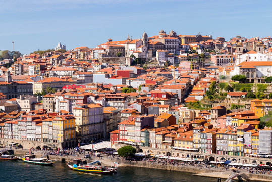 Porto, Portugal old town ribeira aerial promenade view with colorful houses, Douro river, panoramic view © rostovdriver
