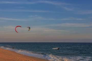 A good afternoon to practice Windsurfing and Kitesurfing (Flysurf) at Cabrera beach at sunset with the waves of the sea at your point.
