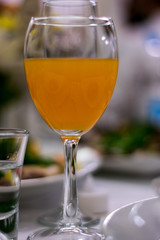 glass of juice on wedding table