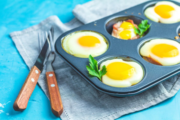  Portioned casserole from bacon sowbelly and eggs in Italian style