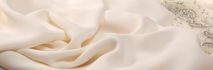 Closeup ivory cloth for wedding dress