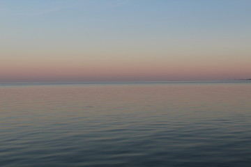 the North Sea, dipped in the evening sun in pastel colors