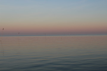 the North Sea, dipped in the evening sun in pastel colors