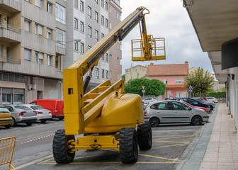construction lift on the street near the house