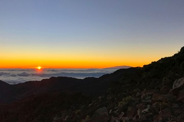 Sunrise at the top of Haleakala in Maui, Hawaii on a crisp sunny morning,