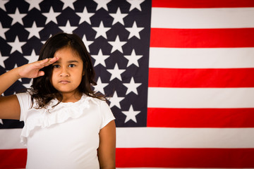 Young Girl Saluting American Flag - Room for Text