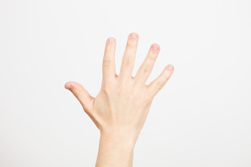 Man hand showing five fingers on white background. Human arm - five fingers