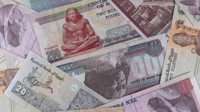 Egypt pound banknotes slow rotating. Egyptian money currency. 4K stock video footage