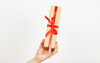 male hand hold present gift for living girlfrirnd isolated