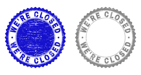Grunge WE'RE CLOSED stamp seals isolated on a white background. Rosette seals with grunge texture in blue and gray colors. Vector rubber stamp imitation of WE'RE CLOSED text inside round rosette.