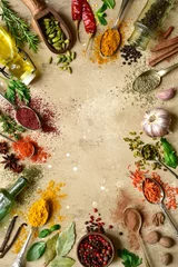 Poster Assortment of natural spices on a spoons. Top view with copy space. © lilechka75