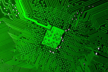 Close up photo of green pcb printecd circuit board electric paths
