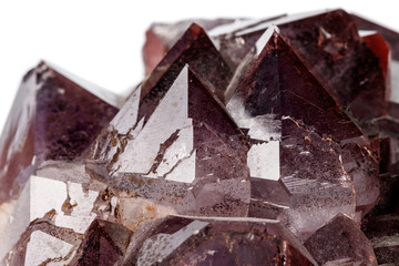 Macro mineral stone Amethysts, Goethite, Epidote on a white background