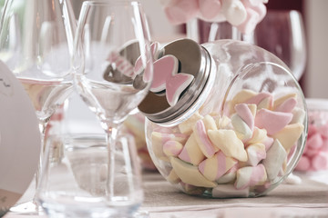 Candy and marshmallow in a pot available to the most greedy