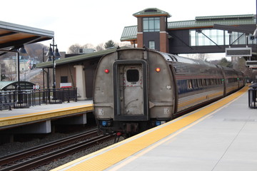 Train on tracks headed out of the station. 