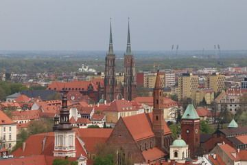 Fototapeta premium View from the tower of the church of Saint Elizabeth to the old town, the cathedral, Ostrów Tumski, churches, the Odra river, blocks of flats, the Olympic Stadium. Wrocław, Breslau, Poland, Polen,