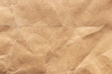 Texture and background of crumpled brown paper. Empty template and mockup for designers.