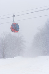 Ski gondola in a snow storm, Stowe, Vermont, USA © Don Landwehrle