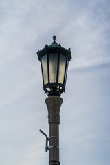 Fototapeta na wymiar street lamp in the cloudy sky