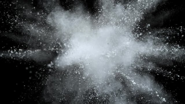 Super slowmotion shot of white powder explosion isolated on black background. Shot with high speed cinema camera at 1000fps