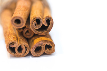 Cinnamon sticks on white background, isolated, close up