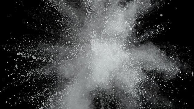Super slowmotion shot of white powder explosion isolated on black background. Shot with high speed cinema camera at 1000fps