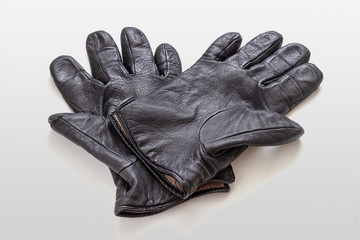 Two leather gloves