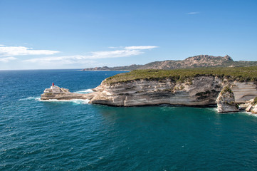 Fototapeta na wymiar Rocky cliffs from the sea near Bonifacio in the south of the island of Corsica