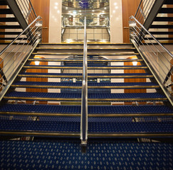 A particular view of a luxurious staircase in a cruise ship.