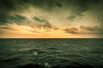 Obraz premium Tremiti islands barely visible along the horizon line in the Adriatic Sea