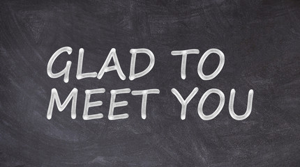 Glad to meet you written on blackboard